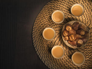 Flat lay dates with Arabian coffee