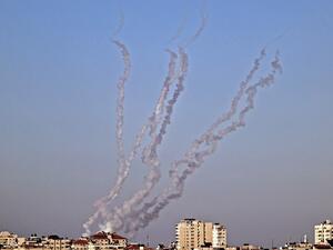 Some rockets fired towards Israel by Palestinian Islamist movement Hamas billows in the air in Gaza City 
