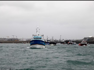 Military boat sent to save fishing vessels blockade the harbour