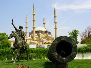 A view from the historical city center of Edirne. Selimiye Mosque, a symbolic cannonball and the monument of Ottoman empire Mehmed II,commonly known as Mehmed The Conqueror.