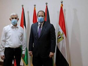 اللواء عباس كامل، ويحيى السنوار