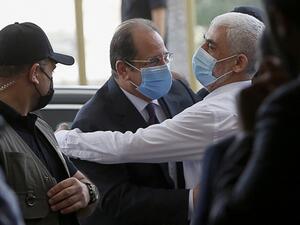 Yahya Sinwar (R), Hamas' political chief in Gaza, embraces General Abbas Kamel (C), Egypt's intelligence chief, as the latter arrives for a meeting with leaders of Hamas in Gaza City on May 31, 2021. Mohammed SALEM / POOL / AFP Hamas official: real chance to achieve prisoner swap with Israel