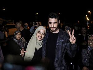 Palestinian activist twins (L to R) Mona and Mohammad el-Kurd, pose for a photo together after being released by Israeli authorities in the neighbourhood of Sheikh Jarrah in Israeli-annexed east Jerusalem on June 6, 2021. Ahmad GHARABLI / AFP Palestinian activist twin were released from jail yesterday.