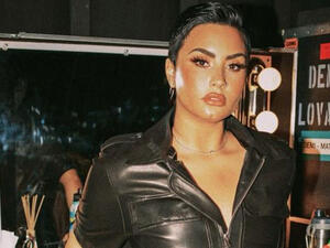 The 28-year-old pop star lost their dad to cancer in June 2013,