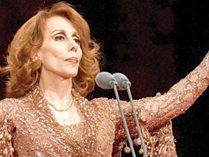 Say What.. Fairouz Is Carrying a Tray and Selling Coffee in Jordan?! Check It Out