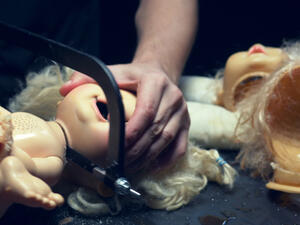 male hands cut off the head 