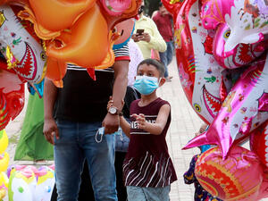 selling toy balloons on the streets 