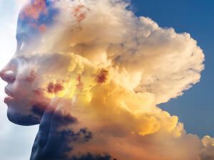 The texture of nature combines with the natural beauty of a young attractive female with dark skin