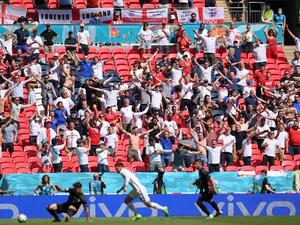 England fans react as they watch the UEFA EURO 2020 Group D match between England and Croatia at Wembley Stadium on June 13, 2021. (Photo: AFP)