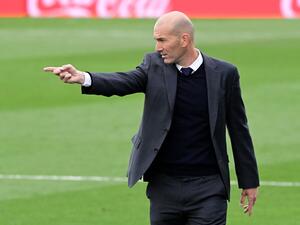 The Frenchman was in no mood to answer questions about his decision to leave Santiago Bernabeu when cornered by reporters in Vallecas (Photo: AFP)