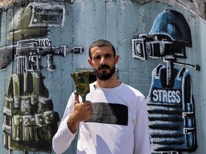 Palestinian Journalists hold one hour strike