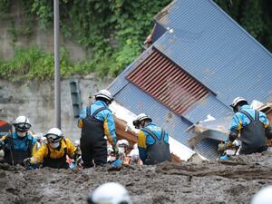 Japanese Rescuers searching for 80 people after devastating landslides