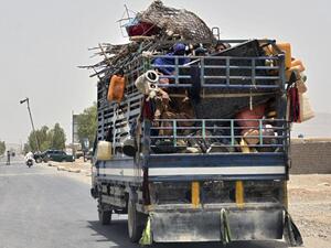 A family flees Panjwai district in Kandahar province on July 4, 2021, after the Taliban captured the area.  © 2021 Javed Tanveer / AFP via Getty Images Insurgent Forces Hold Hundreds; Executions of Residents Linked to Government