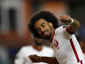 Qatar's forward Akram Afif celebrates after scoring a goal during the Concacaf Gold Cup Prelims football match between Qatar and Panama on July 13, 2021 at BBVA Stadium in Houston, Texas. (Photo: AFP)
