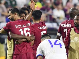 Qatar's Khoukhi Boualem (L) celebrates with teammates after defeating El Salvador following the Concacaf Gold Cup quarter final footbal match between Qatar and El Salvador at State Farm stadium in Glendale, Arizona on July 24, 2021. (Photo: AFP)