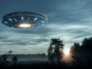 UFO, an alien plate hovering over the field