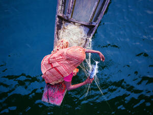 Woman fishing, Bangladesh