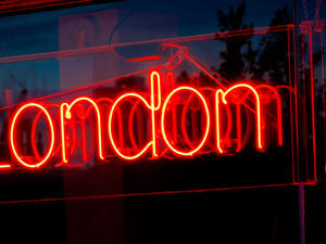 Red neon sign of the word LONDON