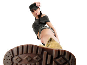 Beautiful woman in military clothes