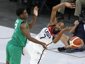 Caleb Agada #3 of Nigeria fouls Kevin Durant #7 of the United States during an exhibition game at Michelob ULTRA Arena ahead of the Tokyo Olympic Games on July 10, 2021 in Las Vegas, Nevada. Nigeria defeated the United States 90-87. (Photo: AFP)