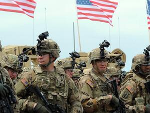 من تغطى بالأمريكان عريان