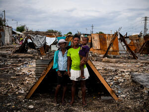 / AFP / CHANDAN KHANNA / TO GO WITH AFP STORY by Amelie BARON, "Raped, widowed, homeless: Haiti's slum women abandoned to gangs" Learn from 2010 Experience; Meet Needs of At-Risk Groups