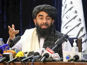 Taliban spokesman Zabihullah Mujahid attends the first press conference, in Kabul, held by the Islamic militant group since it seized power in Afghanistan, August 17, 2021.  © 2021 Kyodo via AP Images International Monitoring Mechanism Urgently Needed