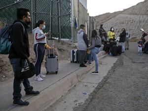 Hundreds of asylum seekers stranded in cities along the Mexican border under the Migrant Protection Protocol, were able to cross to the United States to follow their asylum cases under US President Biden's migration policies. / AFP / Guillermo Arias Biden Administration Should Maintain Course to End ‘Remain in Mexico’ Program