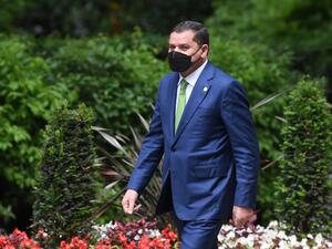 The first signs of a fallout from Tunisian political crisis of relations with neighbouring Libya emerged Friday