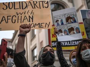 Taliban fighters set woman on fire for bad cooking.