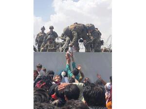 U.S. pauses evacuation flights in Kabul as Qatar refuses to welcome more Afghans