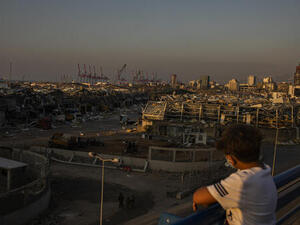 A young Lebanese looks over the area of the Beirut Port explosions on Thursday, August 6, 2020. The massive blast killed more than 20 people including six children; over 6,500 injured including an estimated 1,000 children. “If four million people are forced to resort to unsafe and costly sources of water, public health and hygiene will be compromised."