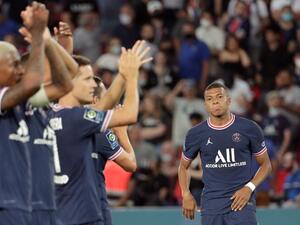 Paris Saint-Germain's players celebrate next to Paris Saint-Germain's French forward Kylian Mbappe (R) after winning the French L1 football match between Paris Saint-Germain and Racing Club Strasbourg at the Parc des Princes stadium in Paris on August 14, 2021. (Photo: AFP)