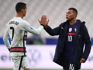 Portugal's forward Cristiano Ronaldo (L) greets France's forward Kylian Mbappe at the end of the Nations League football match between France and Portugal, on October 11, 2020 at the Stade de France in Saint-Denis, outside Paris. (Photo: AFP)