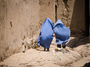 Women in burqas walking home in Kabul, Afghanistan