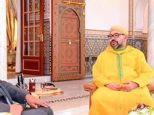 اخنوش ومحمد السادس