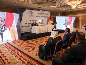 Iraqis listen to Sahr al-Ta'i at the Erbil in Iraq's Kurdistan autonomous region