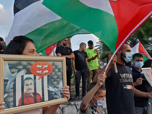 Arab Israeli protesters demonstrate in the mostly Arab city of Umm al-Fahm 
