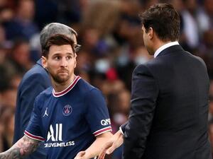 Paris Saint-Germain's Argentinian forward Lionel Messi (C) leaves the pitch after chatting with Paris Saint-Germain's Argentinian head coach Mauricio Pochettino during the French L1 football match between Paris-Saint Germain (PSG) and Olympique Lyonnais at The Parc des Princes Stadium in Paris on September 19, 2021. (Photo: AFP)