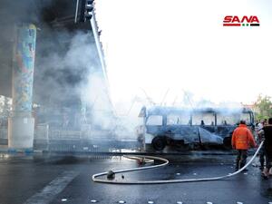 جانب من تفجير  الحافلة عسكرية وسط العاصمة دمشق