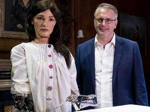 Ai-Da can currently only hold certain hard tools like pencils, not brushes (AFP)