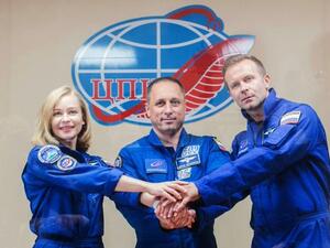 Russian cosmonaut Anton Shkaplerov, actor Yulia Peresild, and film producer Klim Shipenko