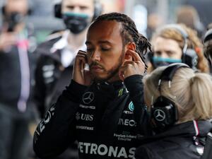 Mercedes' British driver Lewis Hamilton gets ready with his team prior to the start of the Formula One Grand Prix of Turkey at the Intercity Istanbul Park in Istanbul on October 10, 2021. (Photo: UMIT BEKTAS / POOL / AFP)