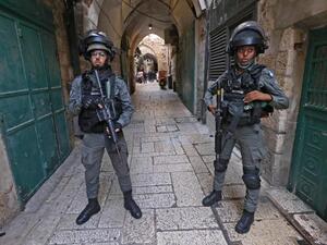 Israeli security forces stand guard in the alleys of Jerusalem's Old City