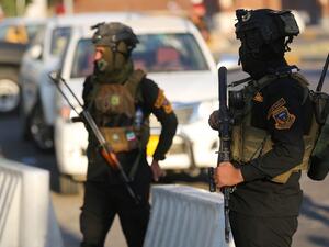 Iraq arrests security officers over death of 20 civilians