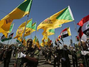 مقاتلون من كتائب حزب الله العراق