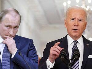 بايدن: بوتين مجرم حرب