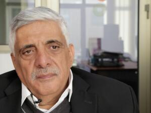 الصحفي الأردني داود كتاب