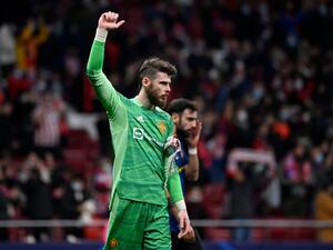 Manchester United's Spanish goalkeeper David de Gea reacts at the end of the UEFA Champions League football match between Atletico de Madrid and Manchester United at the Wanda Metropolitano stadium in Madrid on February 23, 2022. (Photo by OSCAR DEL POZO / AFP)