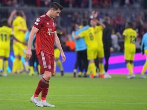 Bayern Munich's Polish forward Robert Lewandowski reacts after the UEFA Champions League quarter-final, second leg football match FC Bayern Munich v FC Villarreal in Munich, southern Germany on April 12, 2022. (Photo by Jose Jordan / AFP)